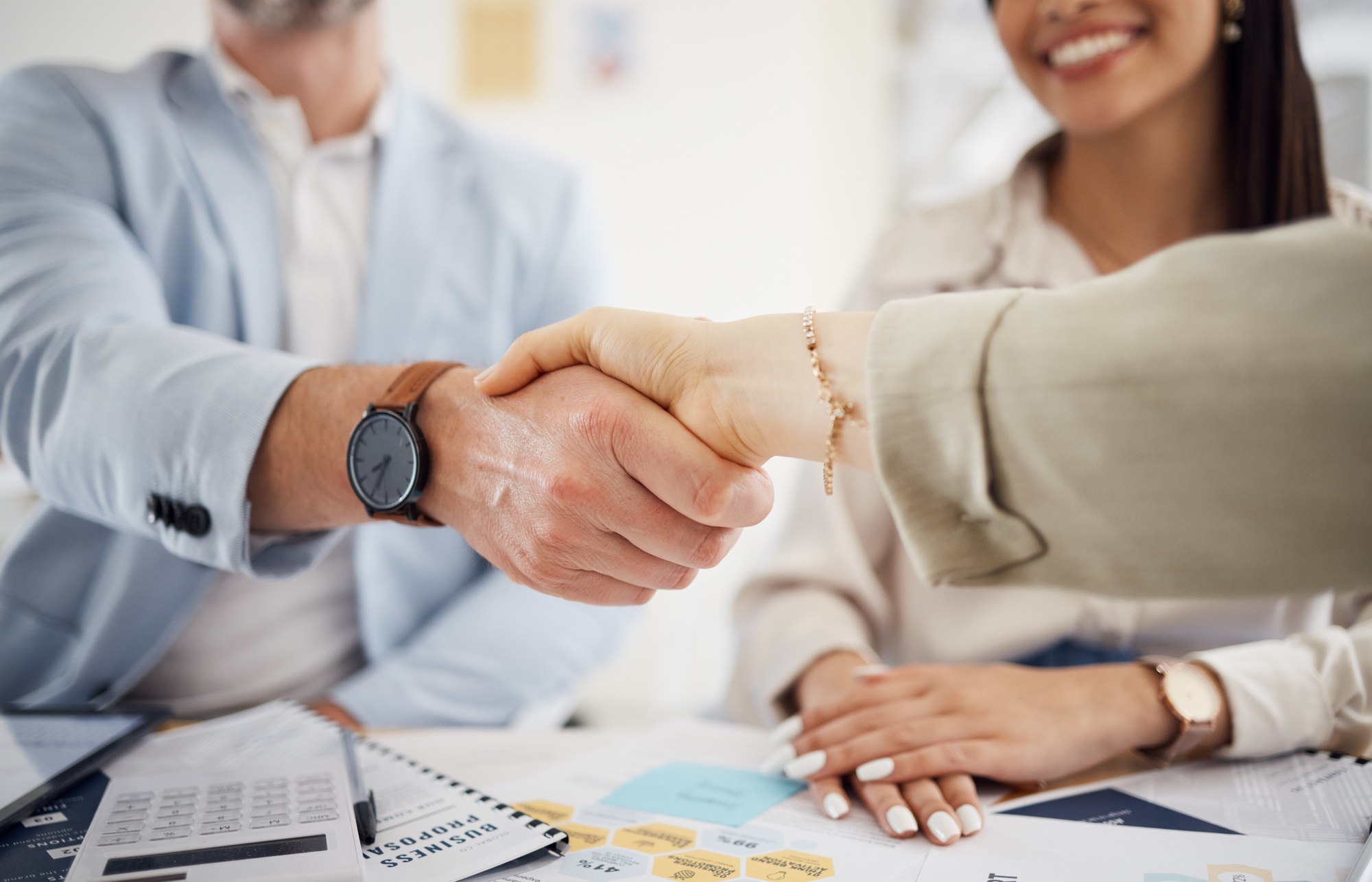 Business people, handshake and meeting in teamwork, hiring or partnership together at office. Close