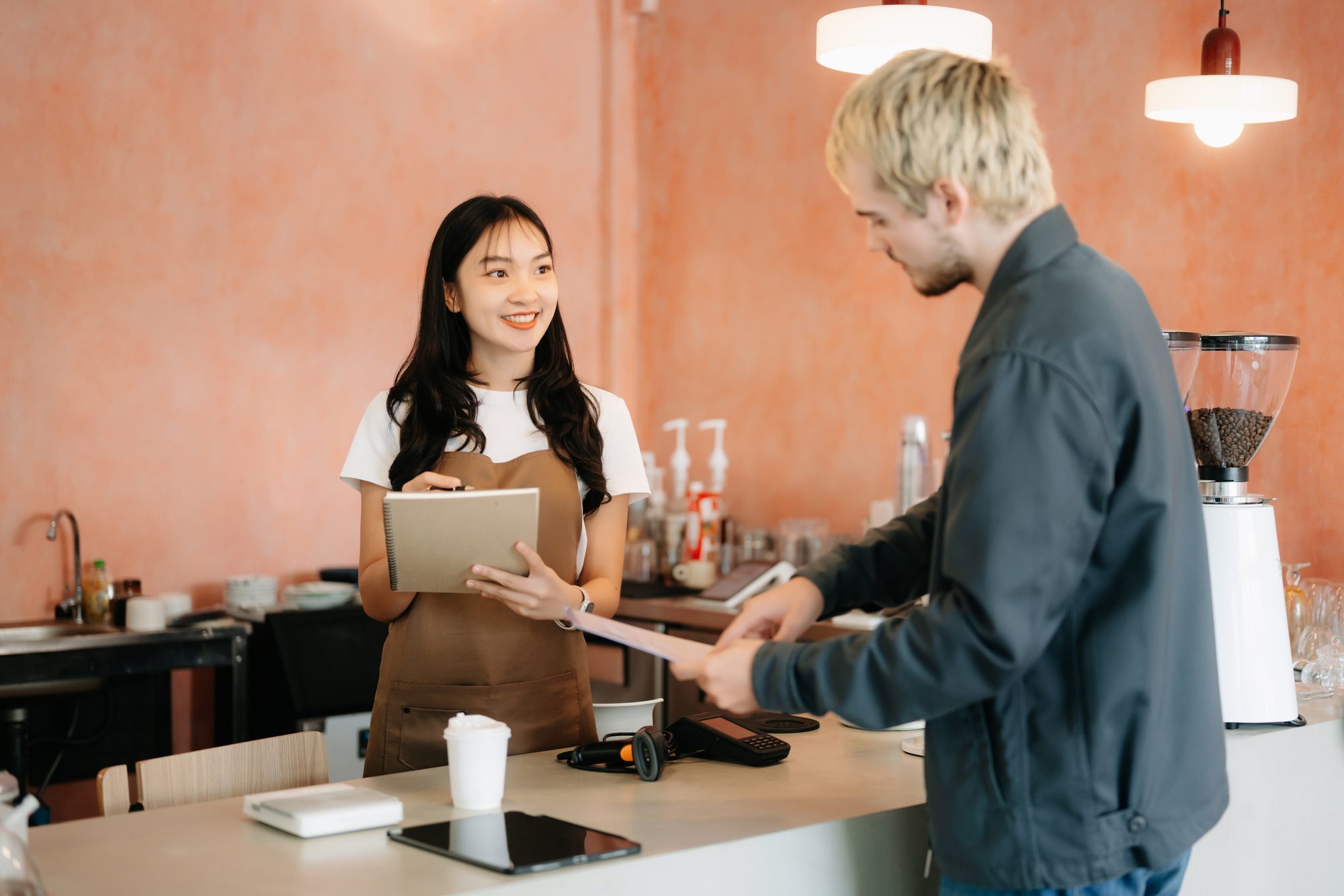 waitress with pos at coffee shop with sale, deal and fintech for customer