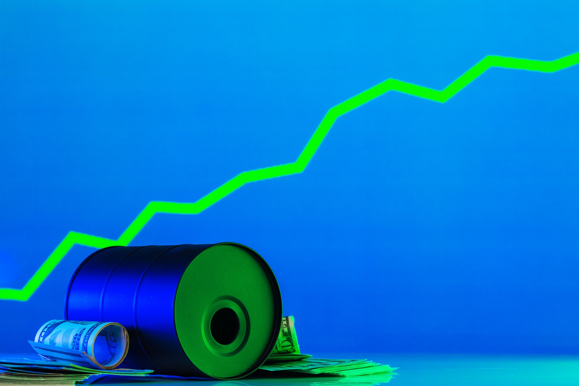 Price of american oil is changing concept. Black barrel with oil and graph