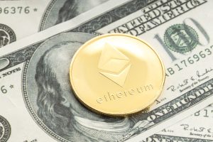 Ethereum coin on dollar banknotes