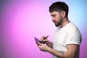 The Digital artist creates NFT non fungible token for crypto art in blockchain